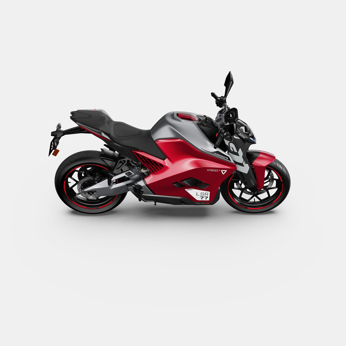Das Ultraviolette F77 Mach 2 Recon - Performance Elektromotorrad von Ultraviolette ist ein modernes rot-schwarzes Sportmotorrad mit schlanken Linien, einem Einzelsitz, Seitenspiegeln und Scheibenbremsen, dargestellt auf einem schlichten weißen Hintergrund.
